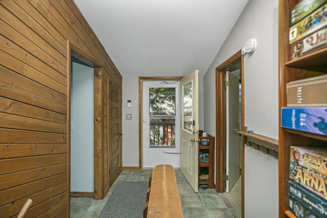24199 N Shore Dr, Edwardsburg, MI 49112 - hallway with a textured ceiling and wood walls