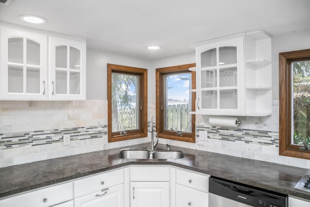 24199 N Shore Dr, Edwardsburg, MI 49112 - kitchen with dishwasher, dark countertops, white cabinetry, a sink, and open shelves