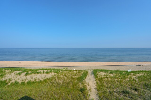 property view of water featuring a beach view