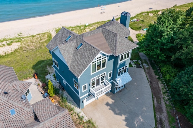 aerial view with a view of the beach and a water view