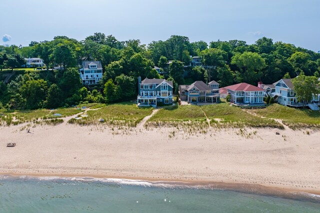 aerial view with a view of the beach and a water view