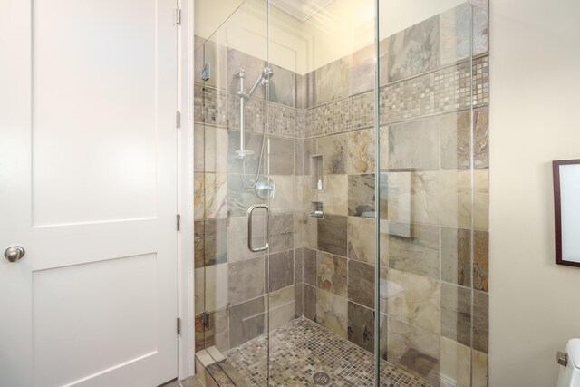 full bathroom featuring a shower stall