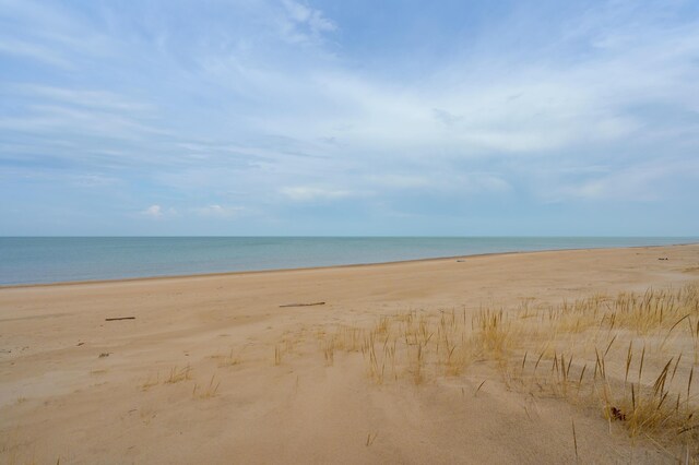 water view featuring a beach view
