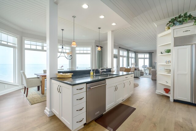 kitchen with light wood-style flooring, a sink, crown molding, and dishwasher