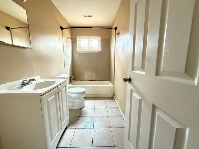 17684 Fenton St, Detroit, MI 48219 - bathroom with visible vents, toilet, tub / shower combination, vanity, and tile patterned flooring