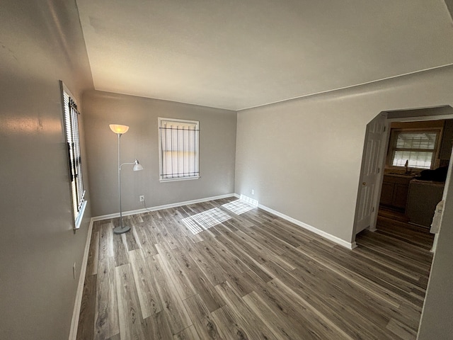 18484 Ashton Ave, Detroit, MI 48219 - spare room featuring wood finished floors, baseboards, and a wealth of natural light