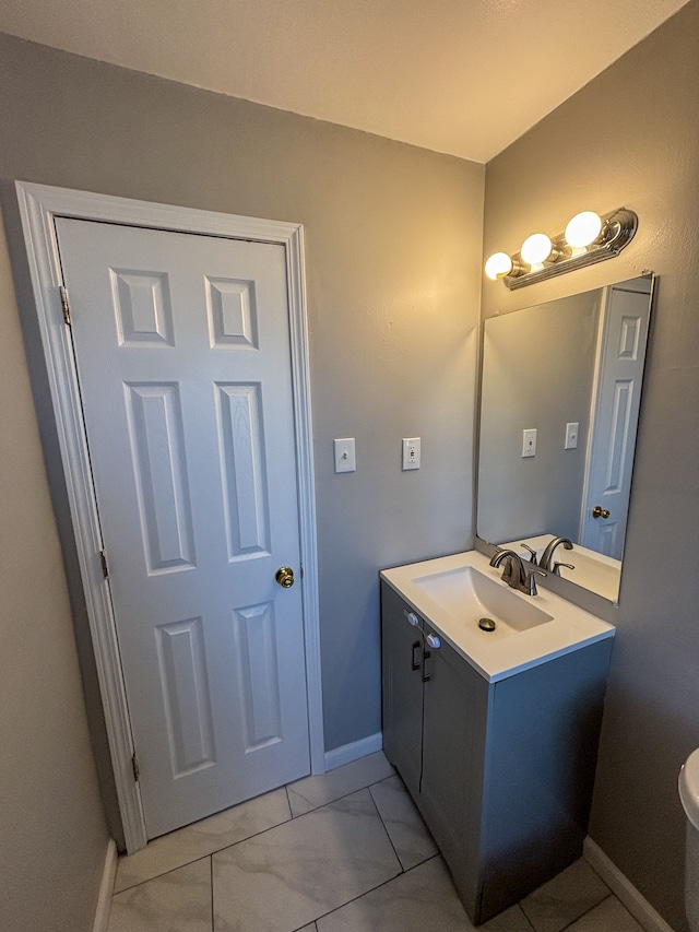 18484 Ashton Ave, Detroit, MI 48219 - half bath featuring vanity and baseboards