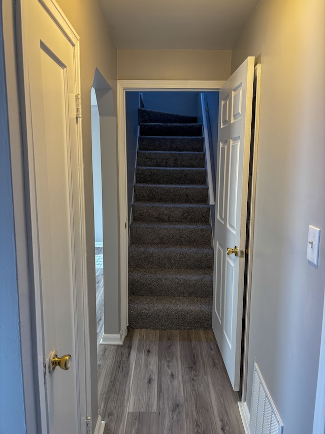 18484 Ashton Ave, Detroit, MI 48219 - stairway featuring visible vents and wood finished floors