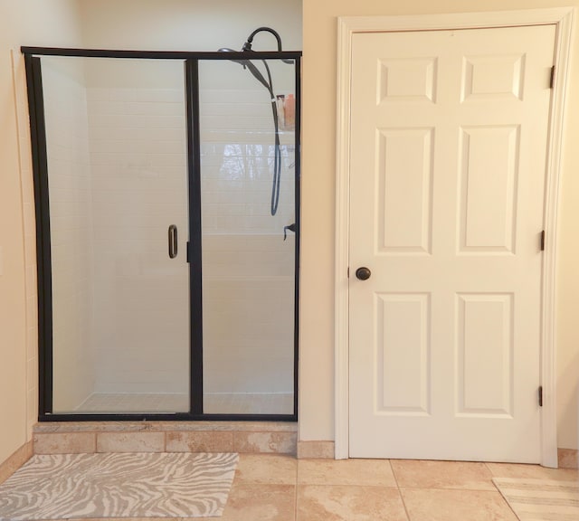bathroom with a shower stall