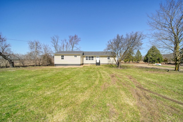 view of front of property with a front lawn