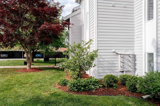 750 Centre Pl, Traverse City, MI 49686 - view of property exterior with a lawn