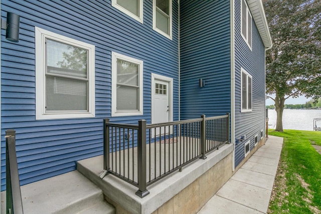 8841 Waruf Ave, Portage, MI 49002 - view of exterior entry featuring a water view