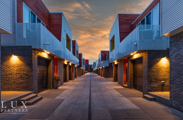 view of home's community with an attached garage
