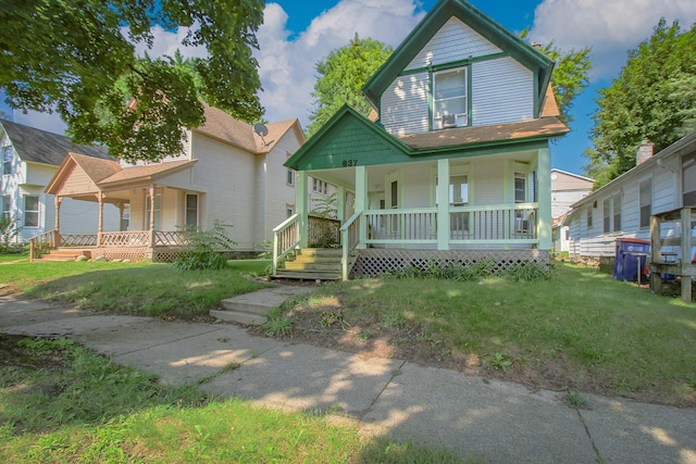 637 Prospect Ave NE, Grand Rapids, MI 49503 - victorian home with covered porch and a front yard