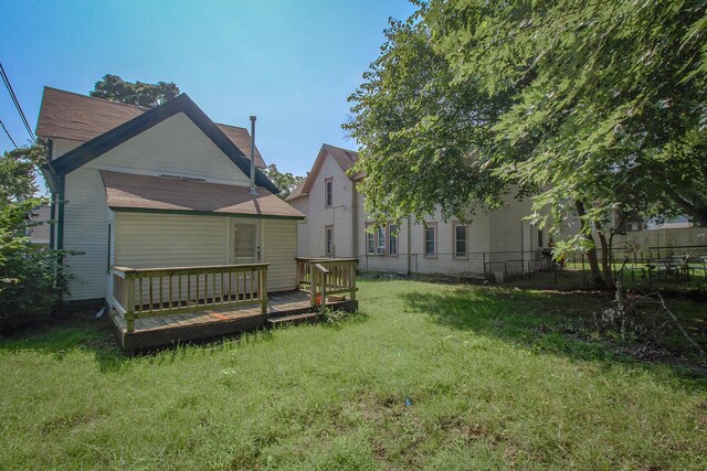 637 Prospect Ave NE, Grand Rapids, MI 49503 - rear view of house featuring a deck