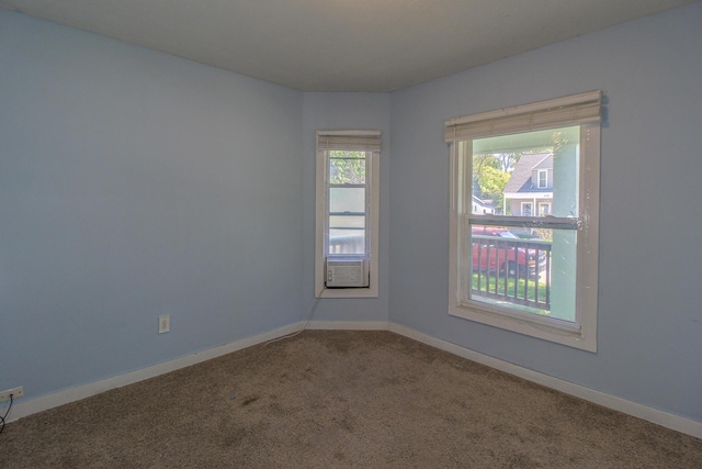 637 Prospect Ave NE, Grand Rapids, MI 49503 - unfurnished room featuring carpet floors and baseboards