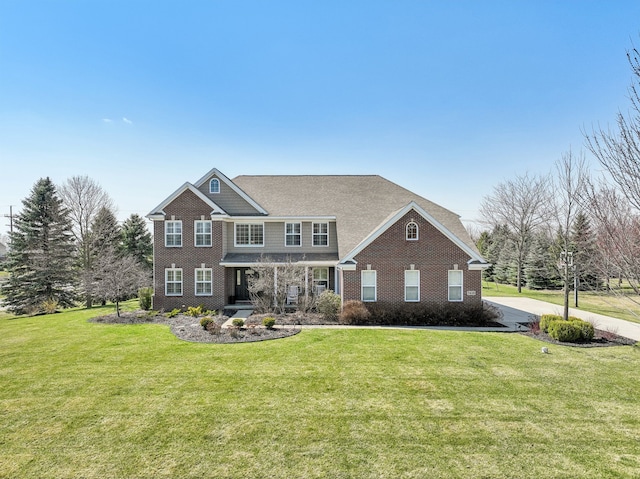 7416 Secretariat Dr, Saline, MI 48176 - view of front of house featuring a porch, a front lawn, and brick siding
