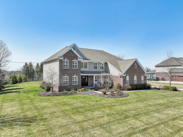 7416 Secretariat Dr, Saline, MI 48176 - view of front of house with a front lawn and brick siding