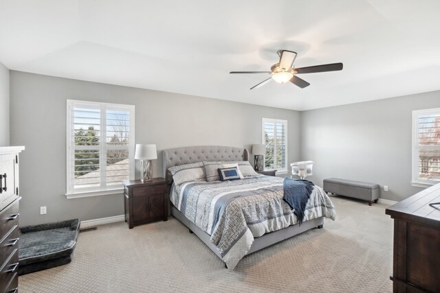 7416 Secretariat Dr, Saline, MI 48176 - bedroom with ceiling fan, light colored carpet, and baseboards