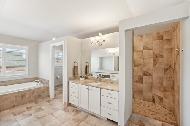 7416 Secretariat Dr, Saline, MI 48176 - full bathroom featuring a chandelier, a bath, tiled shower, and vanity