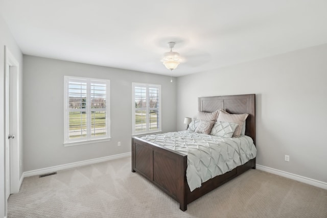 7416 Secretariat Dr, Saline, MI 48176 - bedroom with light carpet, baseboards, and visible vents