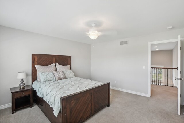 7416 Secretariat Dr, Saline, MI 48176 - bedroom with visible vents, baseboards, and light carpet