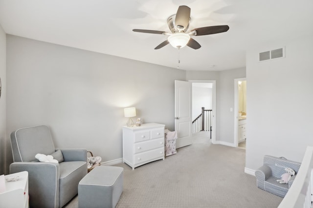 7416 Secretariat Dr, Saline, MI 48176 - living area featuring light colored carpet, baseboards, a ceiling fan, and visible vents