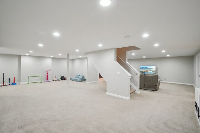 7416 Secretariat Dr, Saline, MI 48176 - playroom featuring light carpet, baseboards, and recessed lighting