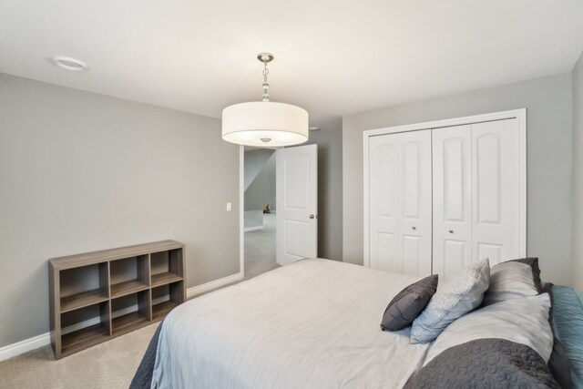 7416 Secretariat Dr, Saline, MI 48176 - bedroom featuring a closet and baseboards