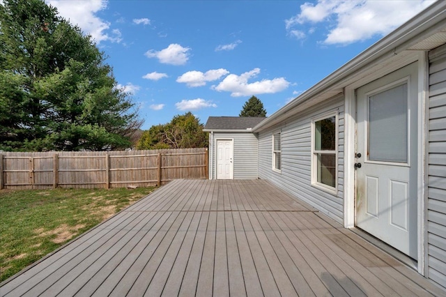 deck with fence and a lawn