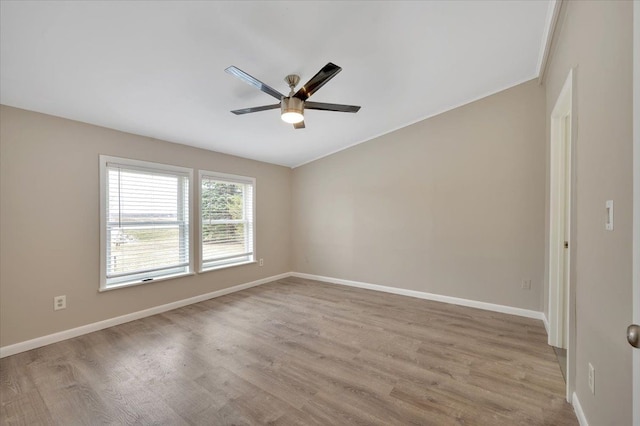 unfurnished room with light wood-style flooring, baseboards, and ceiling fan