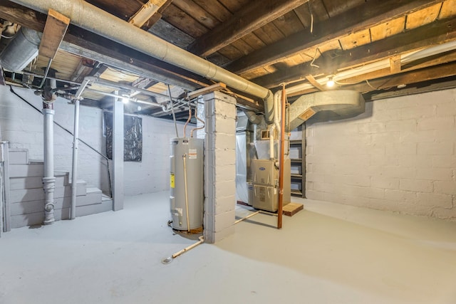 unfinished basement featuring heating unit and gas water heater