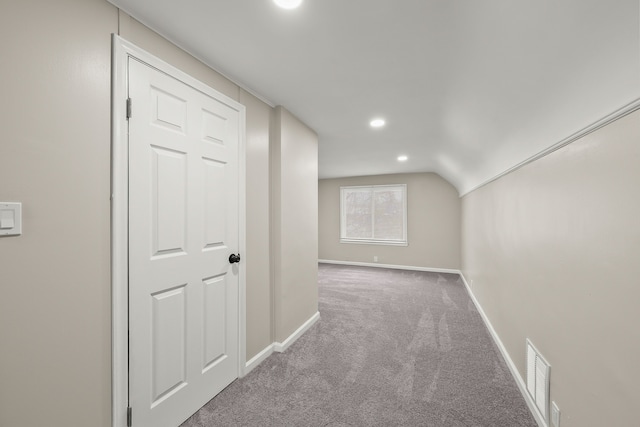additional living space featuring recessed lighting, carpet, baseboards, visible vents, and lofted ceiling
