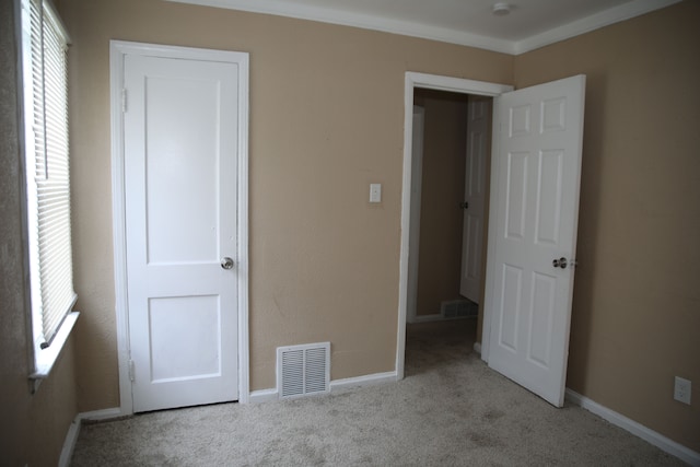 8848 Heyden St, Detroit, MI 48228 - unfurnished bedroom featuring visible vents, baseboards, and carpet floors