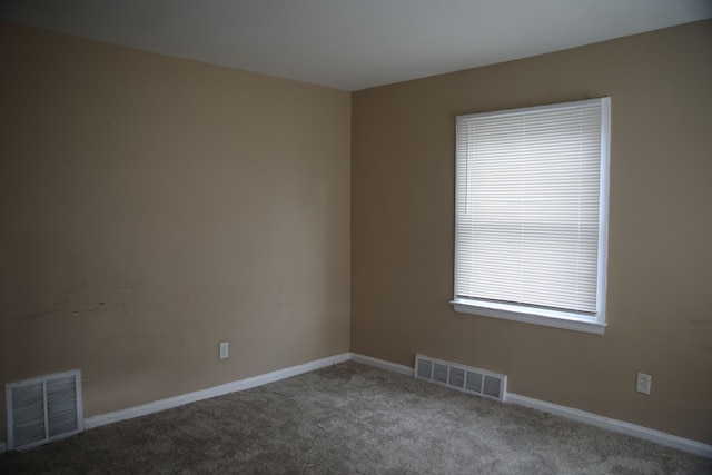 8848 Heyden St, Detroit, MI 48228 - empty room with visible vents, baseboards, and carpet flooring