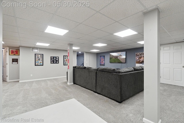 328 Split Rail Rdg, Williamston, MI 48895 - carpeted living room featuring a drop ceiling and baseboards