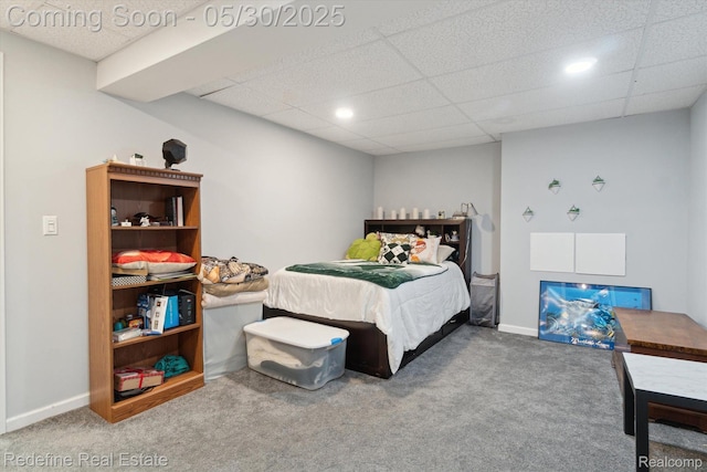 328 Split Rail Rdg, Williamston, MI 48895 - carpeted bedroom featuring a paneled ceiling, baseboards, and recessed lighting
