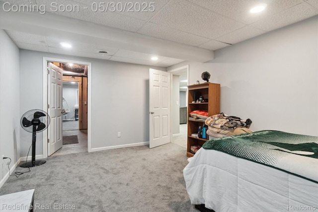328 Split Rail Rdg, Williamston, MI 48895 - carpeted bedroom with baseboards, a drop ceiling, and recessed lighting