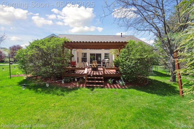 328 Split Rail Rdg, Williamston, MI 48895 - back of house featuring a wooden deck and a lawn