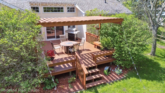 328 Split Rail Rdg, Williamston, MI 48895 - wooden terrace with outdoor dining space and a grill