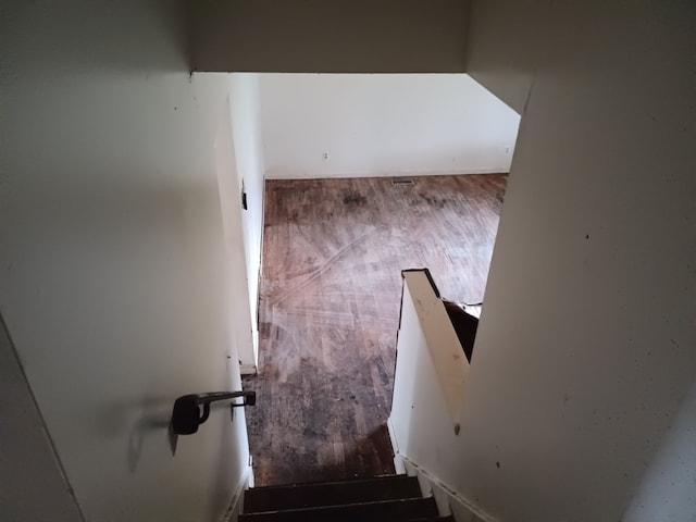 3508 Easthampton Dr, Flint, MI 48503 - stairs with wood finished floors