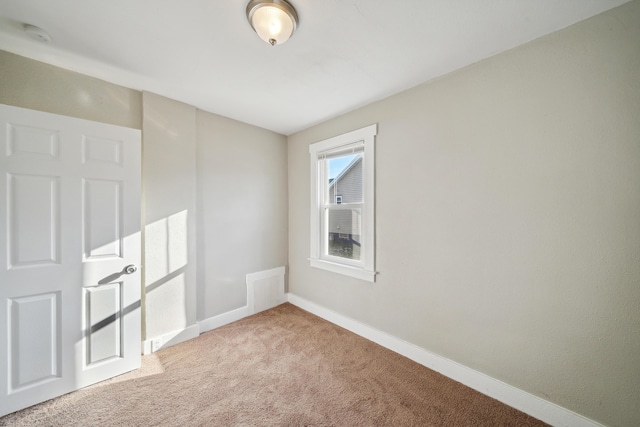 20035 Santa Barbara Dr, Detroit, MI 48221 - unfurnished room featuring light carpet, baseboards, and visible vents