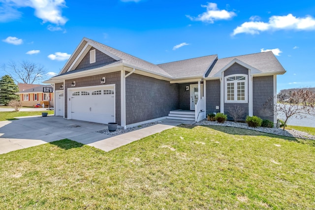 ranch-style home with driveway, an attached garage, a shingled roof, and a front lawn