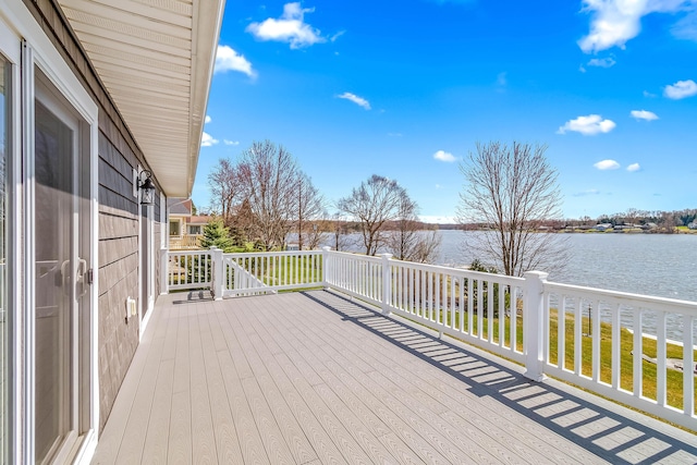 wooden terrace with a water view