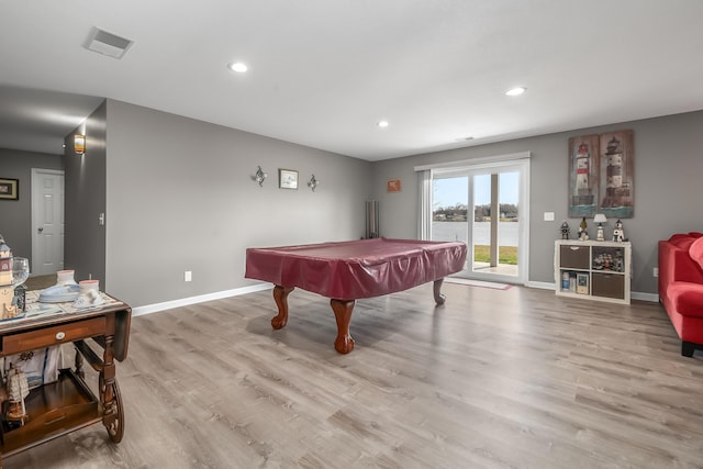 recreation room with baseboards, visible vents, wood finished floors, and recessed lighting