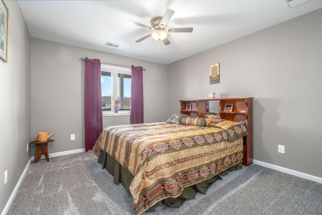 bedroom with baseboards, carpet flooring, ceiling fan, and visible vents