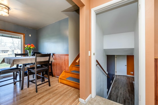 1373 Kingman Dr, Saint Joseph, MI 49085 - dining room with a wainscoted wall and wood finished floors