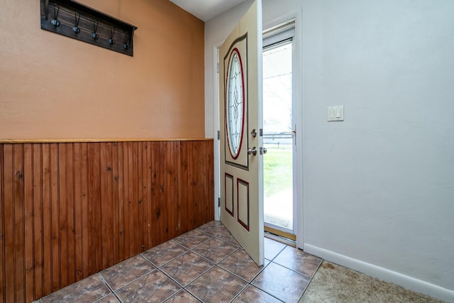 1373 Kingman Dr, Saint Joseph, MI 49085 - tiled foyer entrance featuring wainscoting and wooden walls