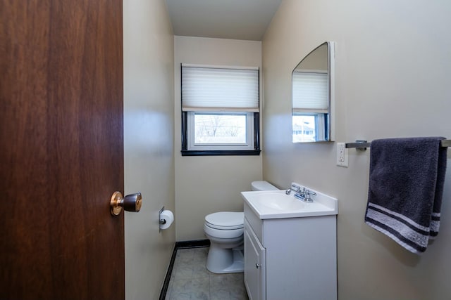 1373 Kingman Dr, Saint Joseph, MI 49085 - half bath with toilet, tile patterned floors, and vanity