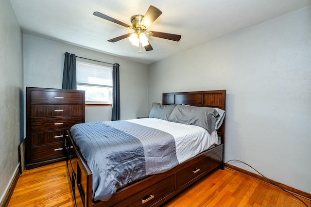 1373 Kingman Dr, Saint Joseph, MI 49085 - bedroom featuring baseboards, light wood finished floors, and ceiling fan